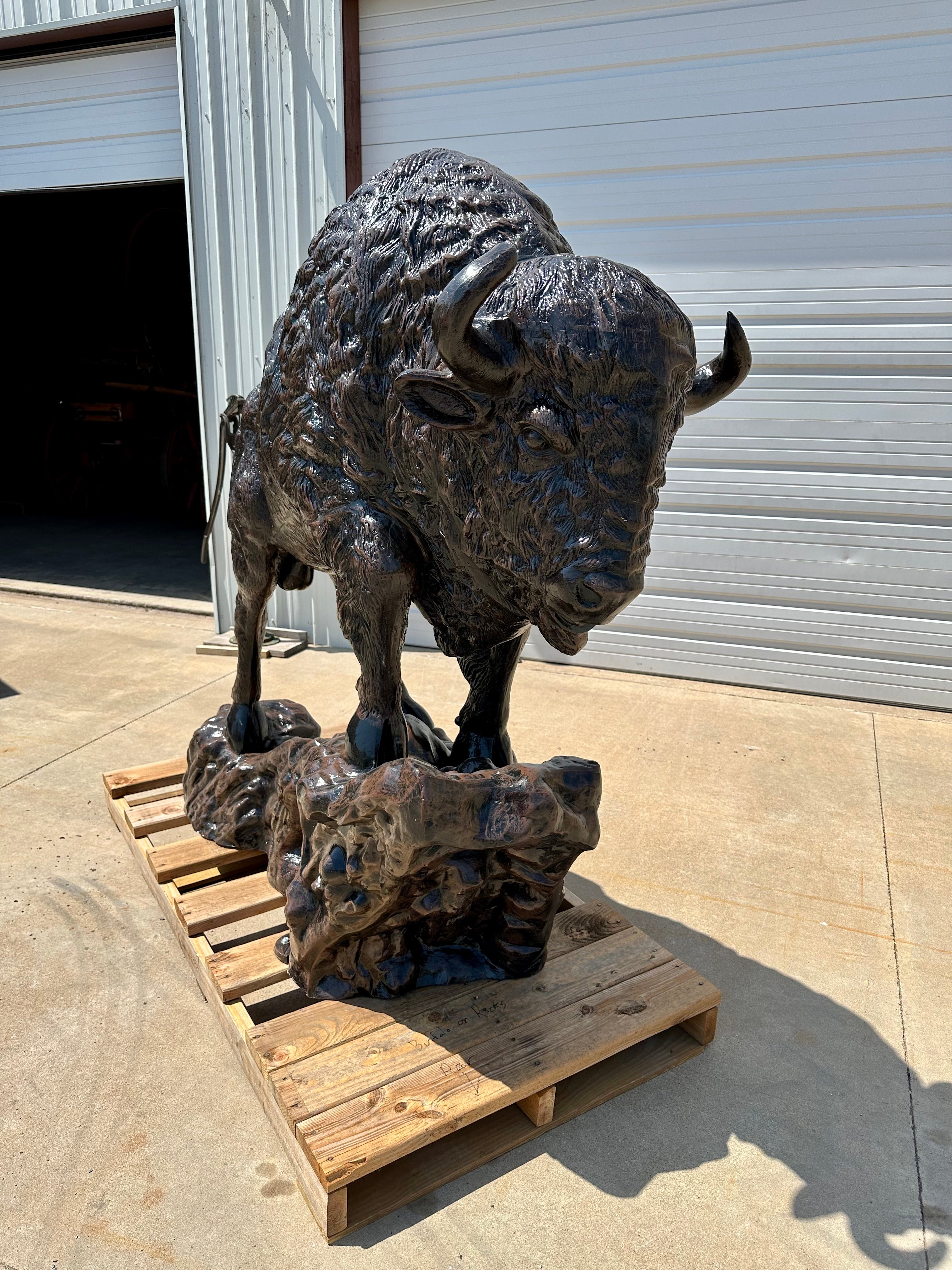 Sold *Medium Buffalo on Rock Statue